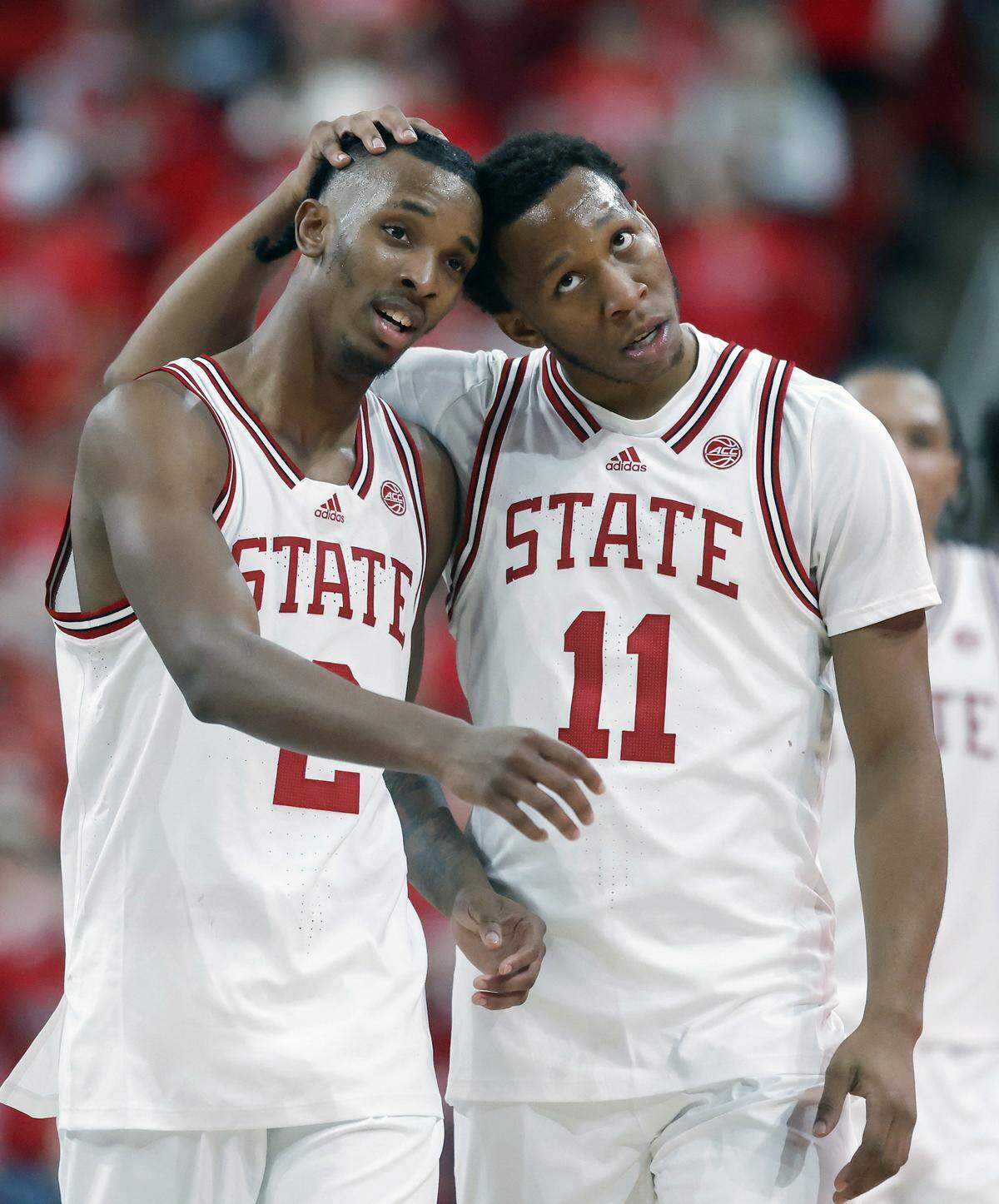 N.C. State’s Paul McNeil Jr. and Quadir Copeland walk down the court together during the second half of the Wolfpack’s 114-66 win over North Carolina Central at Lenovo Center on Nov. 3, 2025, in Raleigh, North Carolina.