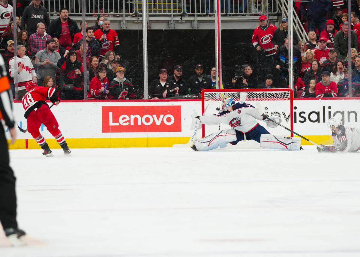 Carolina Hurricanes left wing Jordan Martinook (48) scores a goal past Columbus Blue Jackets goaltender Daniil Tarasov (40) during the second period at Lenovo Center.
