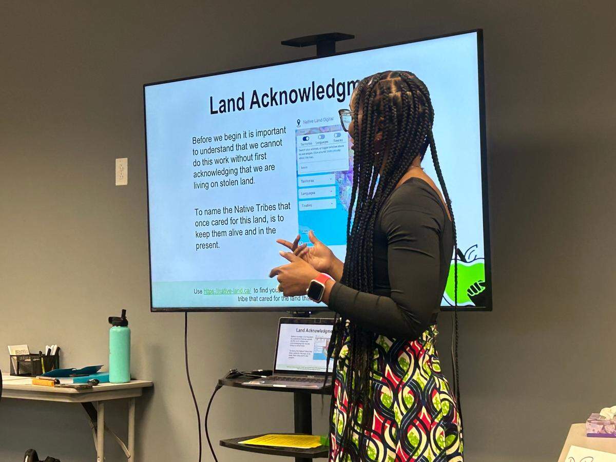 Ronda Taylor Bullock, executive director of the group we are, holds a “land acknowledgment” for Native Tribes at an implicit bias workshop for the Wake County school board on Nov. 16, 2023 in Cary, N.C.