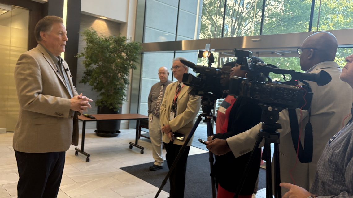 Insurance commissioner Mike Causey spoke to a gaggle of reporters outside the department’s second-floor hearing room in Highwood Towers at 3200 Beechleaf Court in northeast Raleigh on Monday, Oct. 7 -- the first day of a weeks-long hearing into a proposed homeowners’ insurance rate increase.