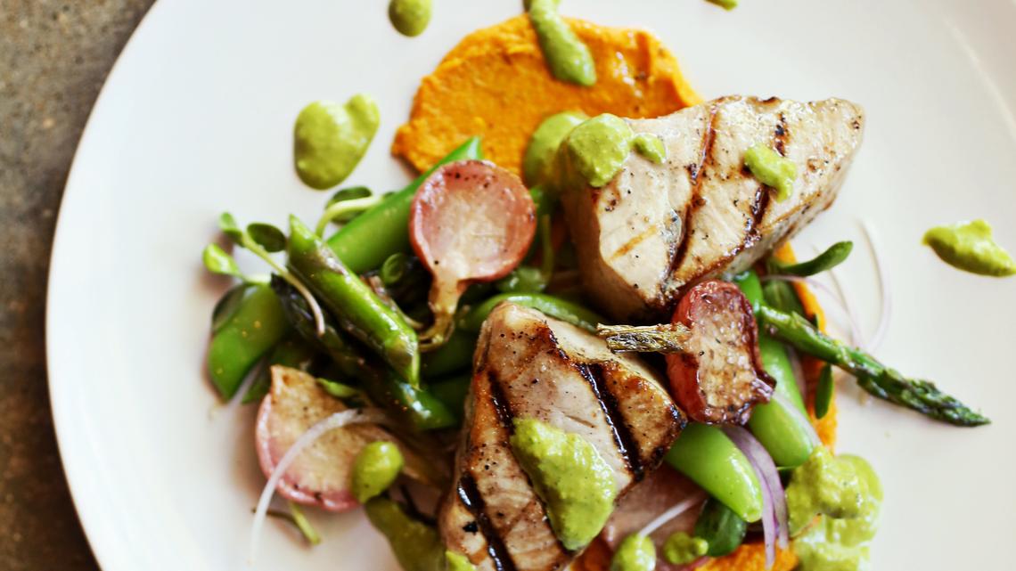 A fish seldom seen this far inland is the wood-grilled Southport cobia at Postal Fish Company in Pittsboro.