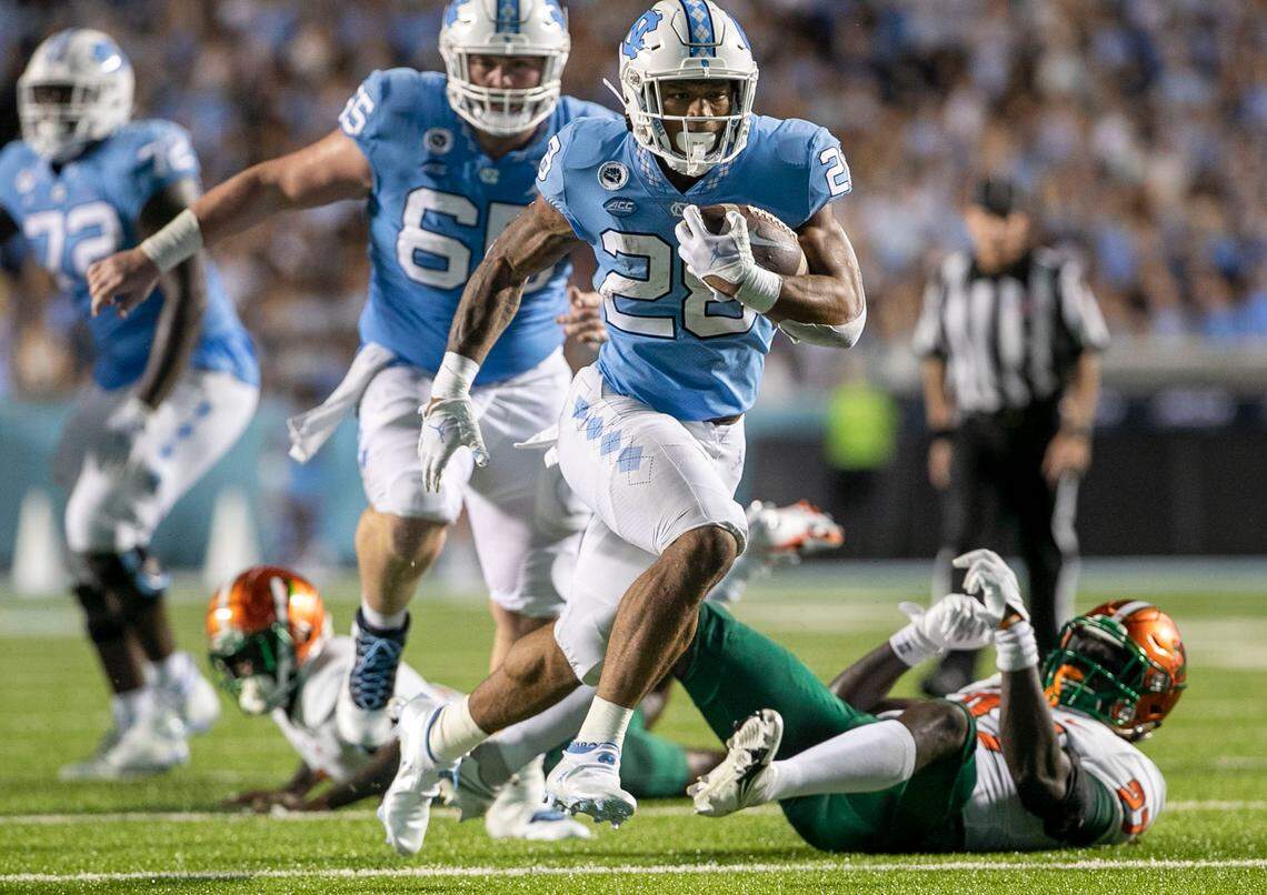 North Carolinas Omarion Hampton (28) picks up 18 yards in the second quarter against Florida A&M to set up a touchdown on Saturday, August 27, 2022 at Kenan Stadium in Chapel Hill, N.C.