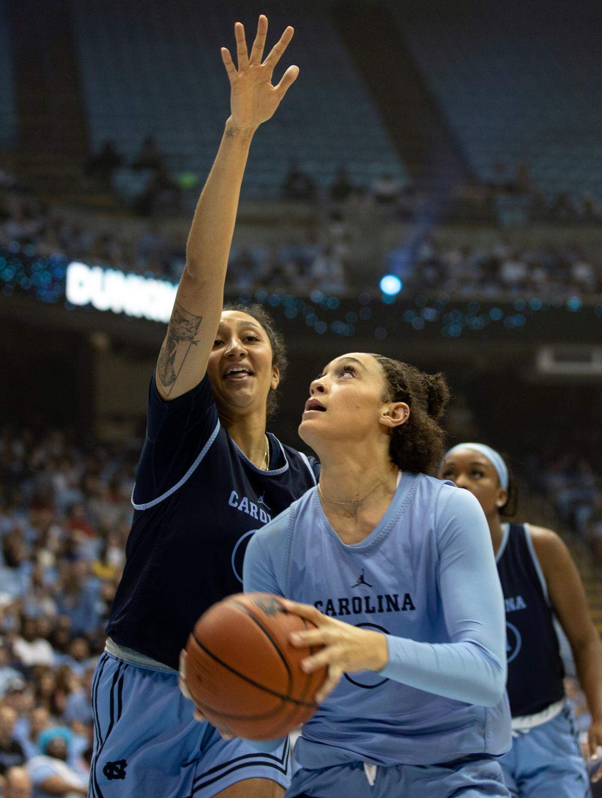 Anya Poole looks to shoot over Alexandra Zelaya during a scrimmage at “Live Action with Carolina Basketball” at the Dean E. Smith Center on Friday, Oct. 7, 2022, in Chapel Hill, N.C.