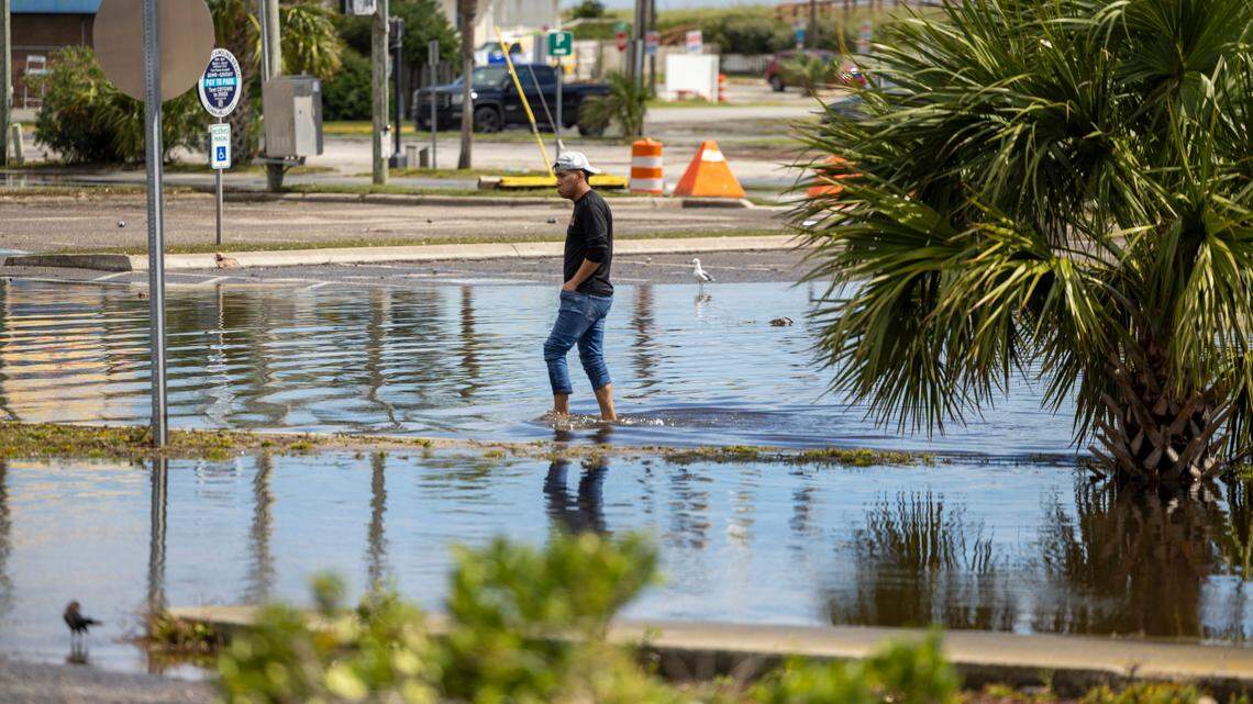 Floodwaters recede in Carolina Beach on Tuesday, Sept. 17, 2024 after an unnamed storm dropped as much as 18 inches of rain in part of southeastern North Carolina over a 72-hour period. Flood Levels in Carolina Beach rivaled that of Hurricane Floyd in 1999.
