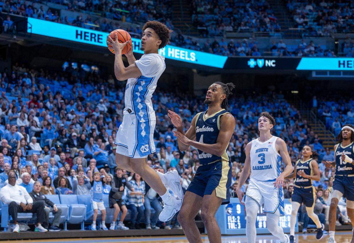 North Carolina’s Seth Trimble (7) breaks to the basket on a fast break in the first half against Charleston Southern on Friday, December 29, 2023 at the Smith Center in Chapel Hill, N.C.