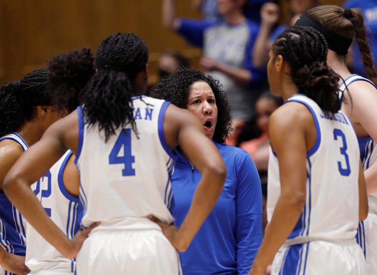 Duke head coach Kara Lawson speaks with her team during the second half of the Blue Devils’ 77-61 loss to South Carolina on Sunday, Dec. 3, 2023, at Cameron Indoor Stadium in Durham, N.C.