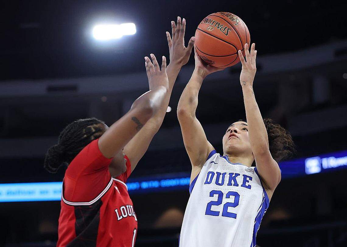 DULUTH, GEORGIA - MARCH 8: Taina Mair (22) of the Duke Blue Devils shoots a basket against Reyna Scott (1) of the Louisville Cardinals during the second quarter of the Women’s ACC Championship between the Duke Blue Devils and Louisville Cardinals at Gas South Arena on March 8, 2026 in Duluth, Georgia.