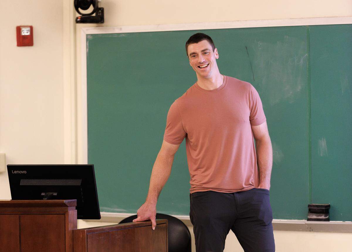Former North Carolina basketball player Tyler Hansbrough smiles while introducing himself during a sports communication class on Tuesday, Aug. 19, 2025, at the UNC Hussman School of Journalism and Media in Chapel Hill, N.C. Hansbrough is co-teaching the course this semester with associate professor Livis Freeman. 