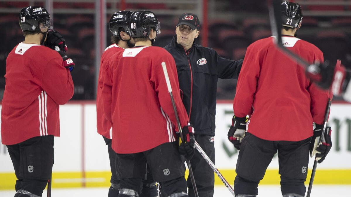 Carolina Hurricanes’ head coach Rod Brind’Amour talks with Sebastian Aho (20), Justin Faulk (27), Teuvo Teravainen (86) and Nino Niederreiter (21) during the Hurricanes’ practice on Sunday, April 21, 2019 at the PNC Arena in Raleigh, N.C. The Hurricanes are preparing for game six of their Stanley Cup playoff series against the Washington Capital on Monday night in Raleigh.