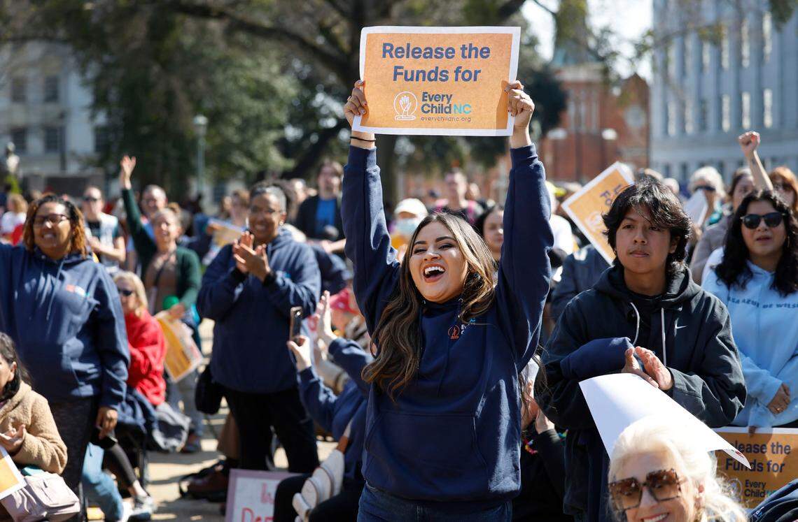 Andressia Ramirez from Wilson cheers during a rally for education funding on the grounds of the N.C. State Capitol in Raleigh Thursday, Feb. 22, 2024. The rally happened as the state Supreme Court heard oral arguments in the long-running Leandro school funding case.
