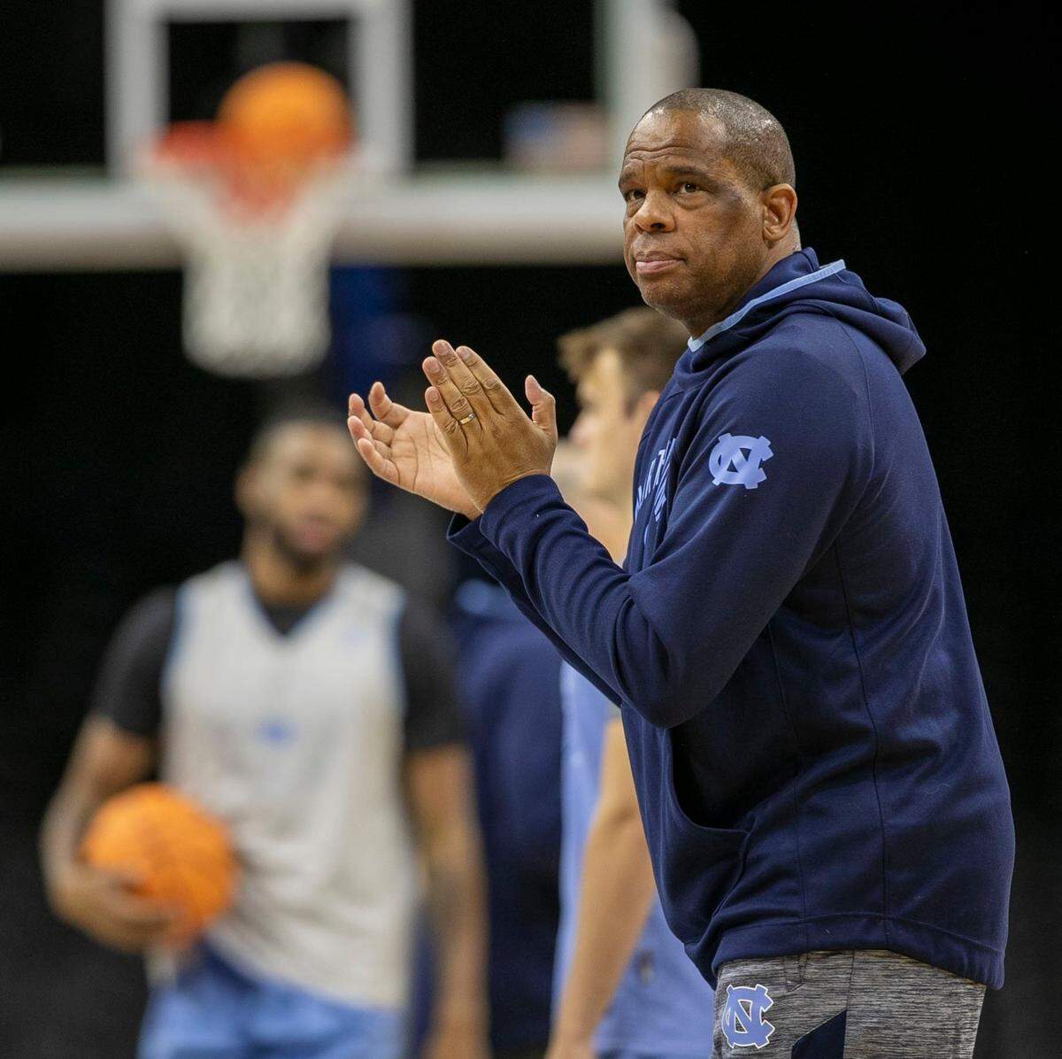 North Carolina coach Hubert Davis watches his players during the Tar Heels open practice on Thursday, March 24, 2022 at Wells Fargo Center in Philadelphia, Pa.