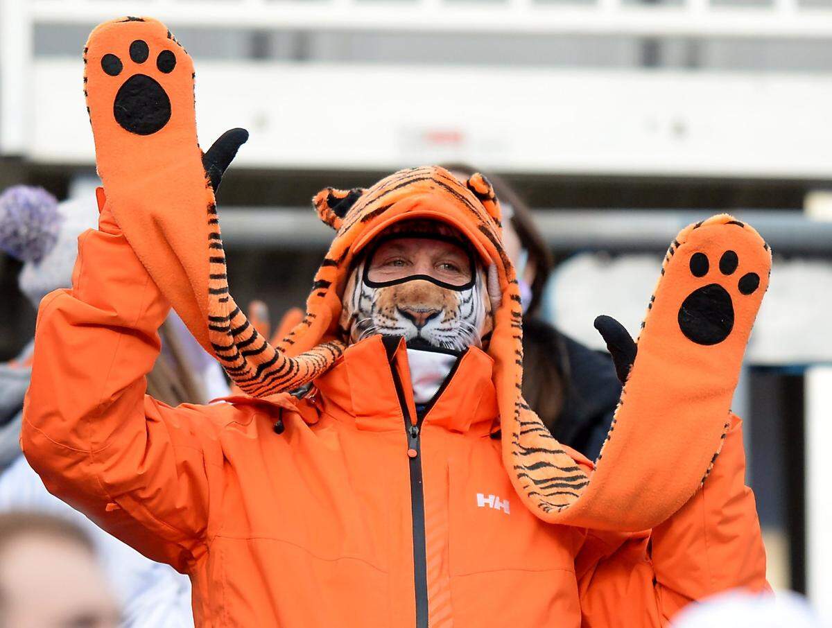 A Clemson Tigers fan celebrates the teamÕs play during second quarter action against Notre Dame at Bank of America Stadium on Saturday, December 19, 2020 in Charlotte, NC. The Clemson Tigers and Notre Dame Fighting Irish faced off in the ACC Championship game.