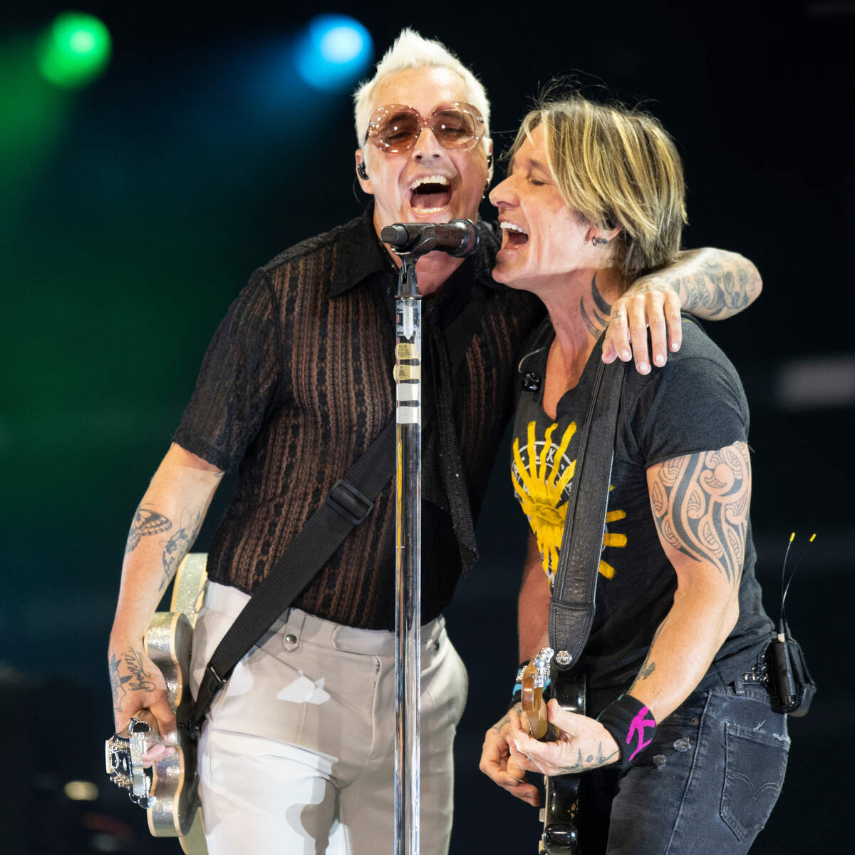 Keith Urban and second guitarist Nathan Barlowe in concert at Raleigh, N.C.’s Coastal Credit Union Music Pavilion at Walnut Creek, Saturday night, Aug. 13, 2022.