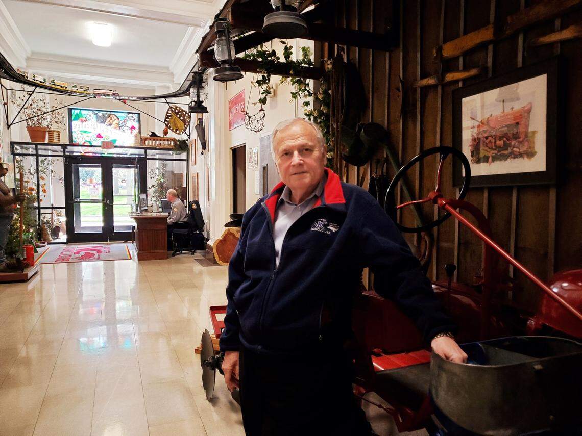 North Carolina Department of Agriculture Deputy Commissioner N. David Smith is pictured here in the lobby of the agency’s headquarters building in downtown Raleigh on March 29, 2022. He will have worked for the state 50 years as of August 2022. He plans to celebrate his work-iversary by coming to work.