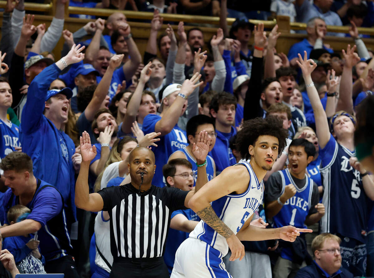 Duke’s Tyrese Proctor reacts after knocking down a three-point basket during the second half of the Blue Devils’ 68-47 win over George Mason on Tuesday, Dec. 17, 2024, at Cameron Indoor Stadium in Durham, N.C.