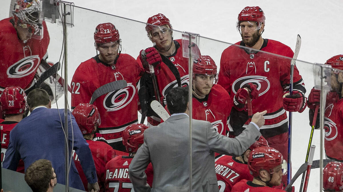 Carolina Hurricanes coach Rod Brind’Amour huddles with his players during the third period against Winnipeg on Thursday, April 21, 2022 at PNC Arena in Raleigh, N.C.