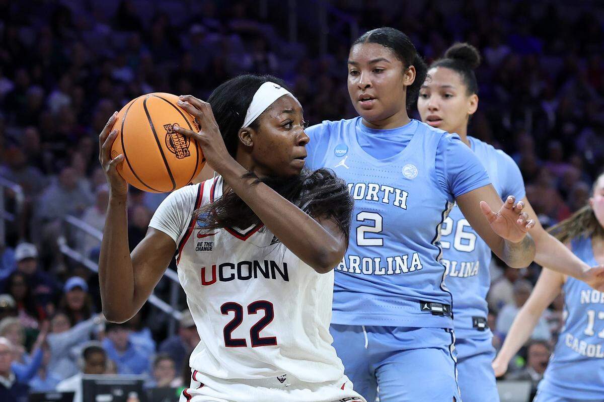 Serah Williams (22) of the UConn Huskies controls the ball defended by Nyla Harris of the North Carolina Tar Heels during the second quarter of the teams’ NCAA Women’s Basketball Tournament Sweet 16 game at Dickies Arena on March 27, 2026 in Fort Worth, Texas.