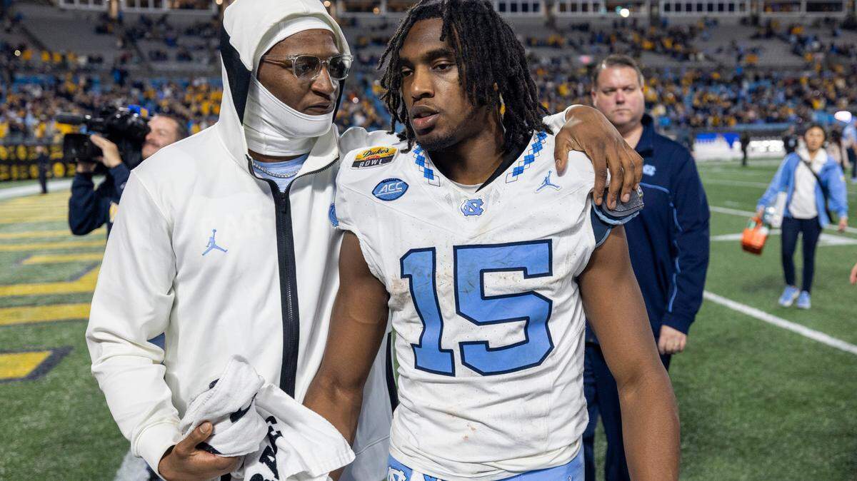 North Carolina quarterback Conner Harrell (15) leaves the field following the Tar Heels’ 30-10 loss to West Virginia in the Duke’s Mayo Bowl on Wednesday, December 27, 2023 at Bank of American Stadium in Charlotte, N.C. Harrell passed for 199 yards, one touchdown and two interceptions.