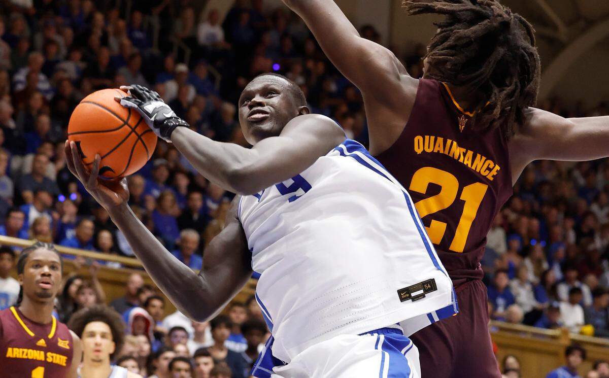 Duke’s Khaman Maluach (9) heads to the basket as Arizona State’s Jayden Quaintance (21) defends during the second half of Duke’s 103-47 victory over Arizona State in the Brotherhood Run Charity Game at Cameron Indoor Stadium in Durham, N.C., Sunday, Oct. 27, 2024.