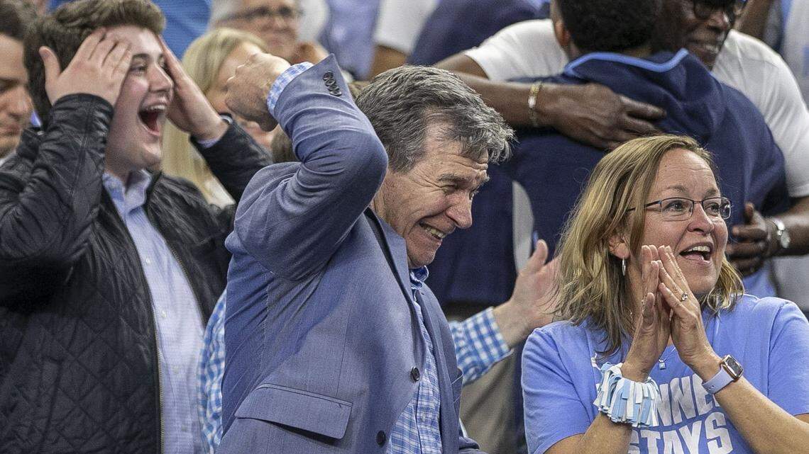 North Carolina Governor Roy Cooper relishes North Carolinas 81-77 victory over Duke in the NCAA Final Four semifinal on Saturday, April 2, 2022 at Caesars Superdome in New Orleans, La.