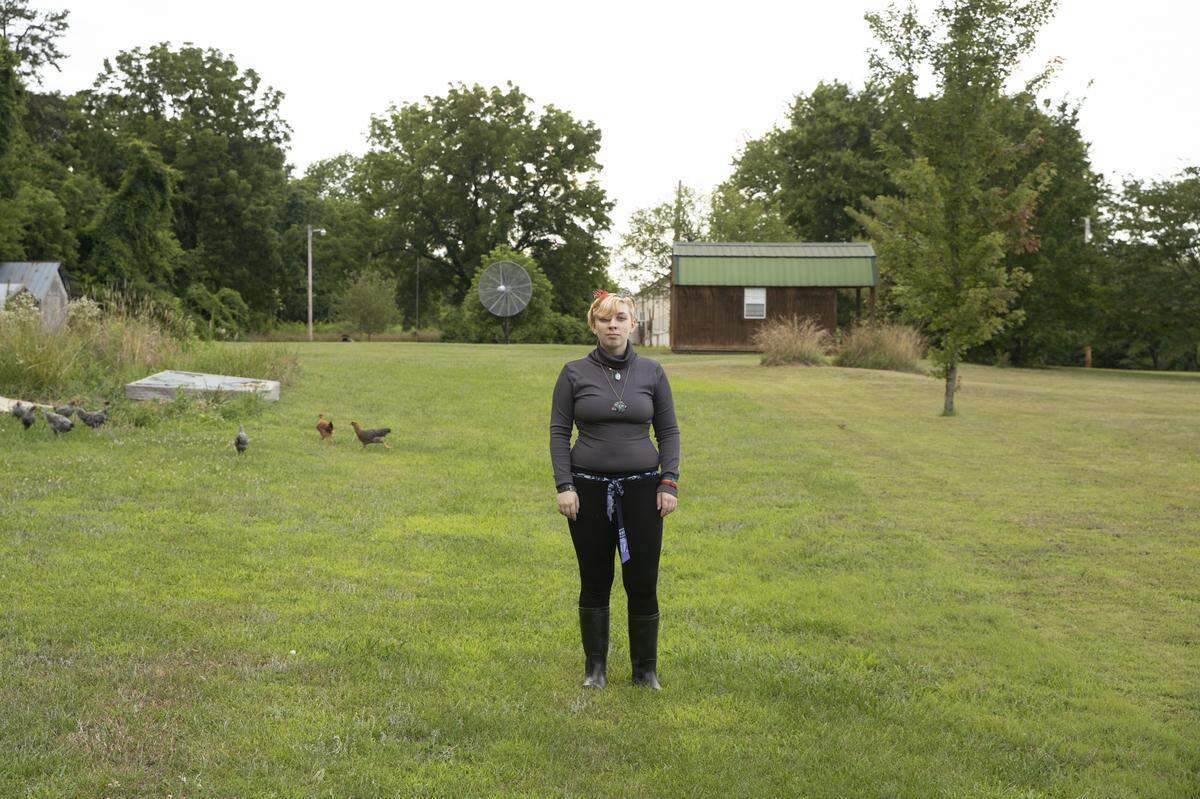 Saun Phelps, a tenth grader at Person High School, poses for a portrait at their home in Semora, N.C., on June 25, 2021. Phelps is non-binary and lives in a rural part of the state.