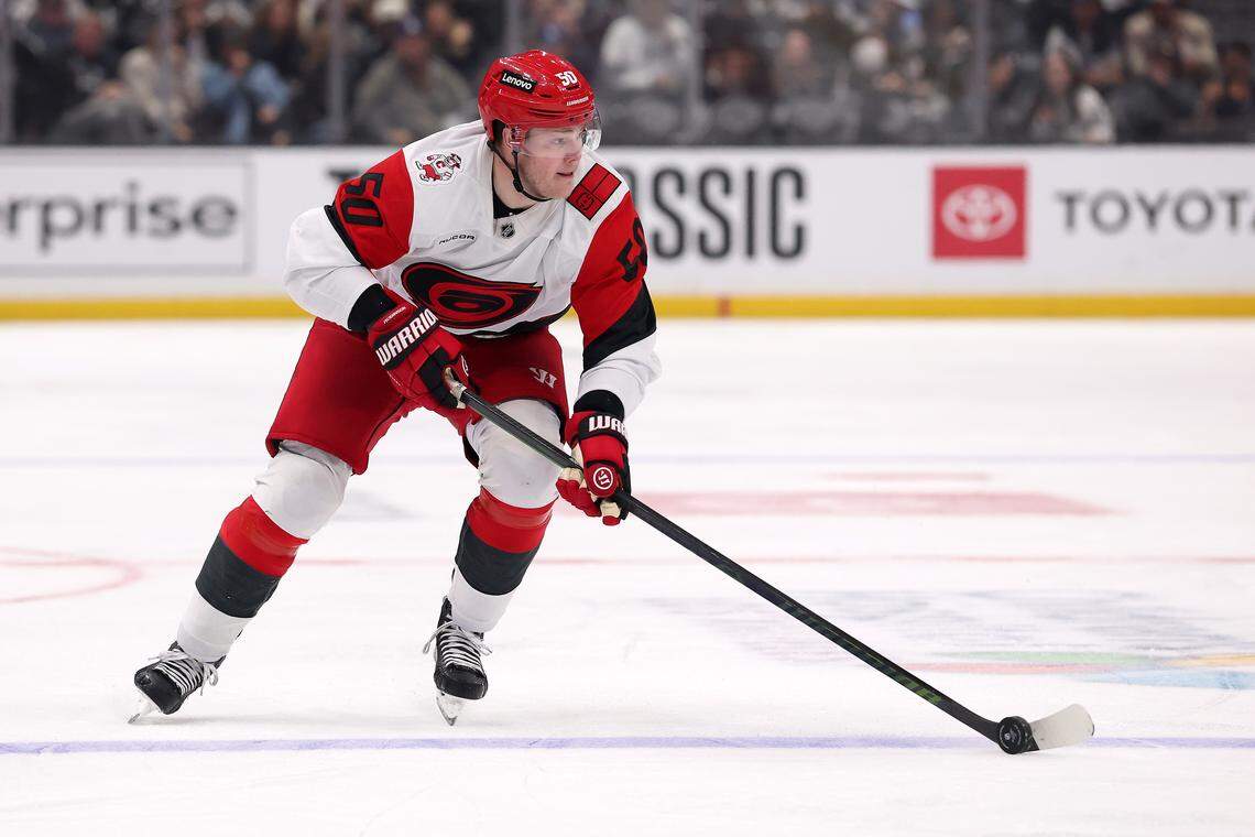 Eric Robinson of the Carolina Hurricanes carries the puck against the Los Angeles Kings at Crypto.com Arena on Oct. 18, 2025 in Los Angeles, California. Robinson returned to the lineup Saturday against the Buffalo Sabres.