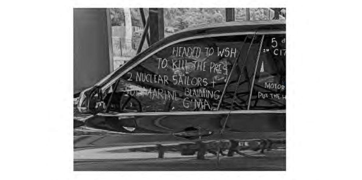 A screenshot from the criminal complaint charging Daniel Swain, who is charged with threatening President Donald Trump. The white lettering on the BMW says “HEADED TO WSH TO KILL THE PRES.”