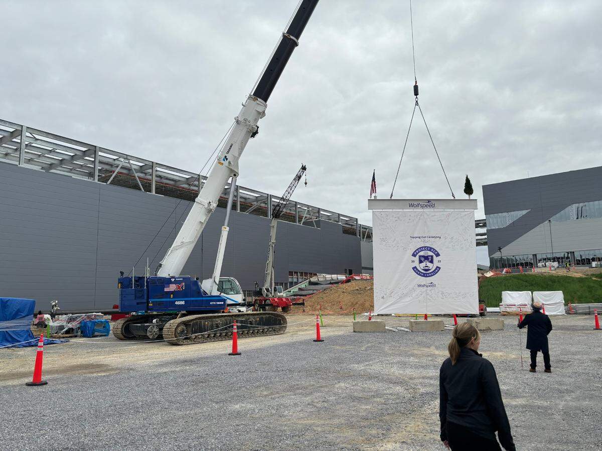 Wolfspeed raised a ceremonial final beam on March 26, 2024 at its future facility in Siler City, North Carolina. 