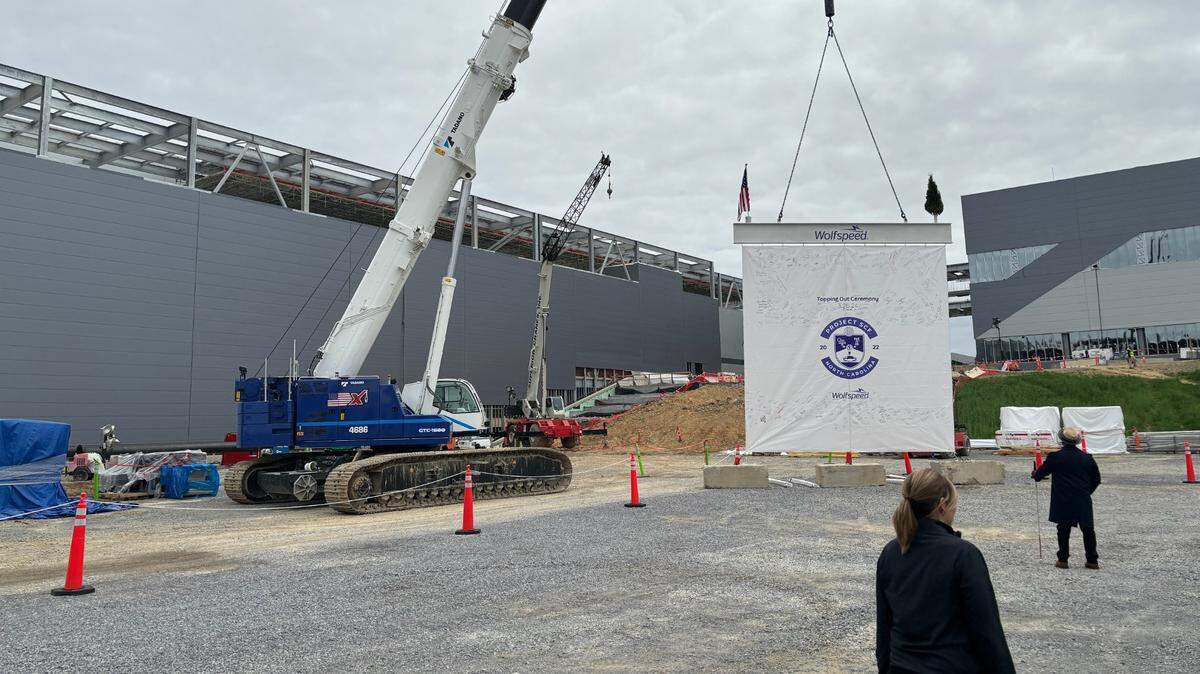Wolfspeed raised a ceremonial final beam on March 26, 2024 at its materials facility in Siler City, North Carolina.