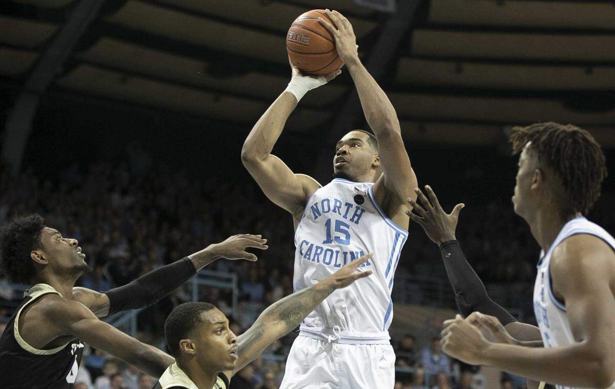 North Carolina’s Garrison Brooks (15) puts up a shot in the second half against Wofford on Sunday, December 15, 2019 at Carmichael Arena in Chapel Hill, N.C. Brooks lead North Carolina with 17 points.