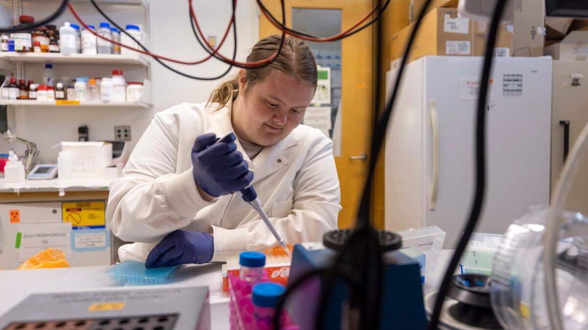 Lab Analyst, Lena Smith, works in the Duke Human Vaccine Institute research lab analyzing proteins on Wednesday, July 13, 2022 in Durham, N.C.