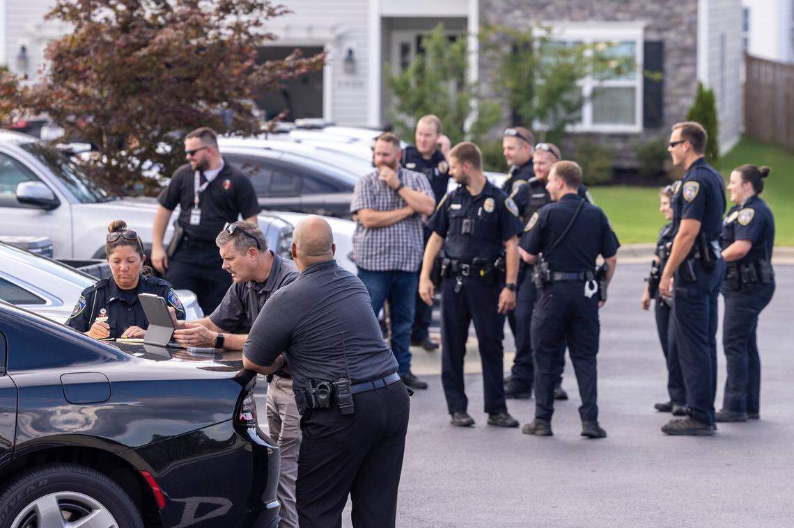 Emergency personnel stage a search Friday, July 29, 2022 in Fuquay-Varina, NC after a twin-engine turboprop aircraft made an emergency landing at RDU International Airport after reported landing gear issues. Another pilot reportedly jumped out of the plane before the landing attempt.