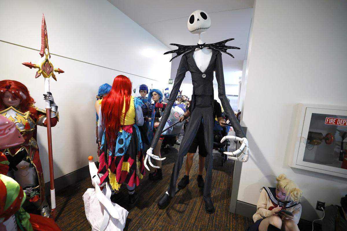 Joshua Holshouser navigates the hallway his cosplay of Jack Skellington from The Nightmare Before Christmas before the Craftmanship Costume Contest at GalaxyCon Raleigh at the Raleigh Convention Center Saturday, July 26, 2025.