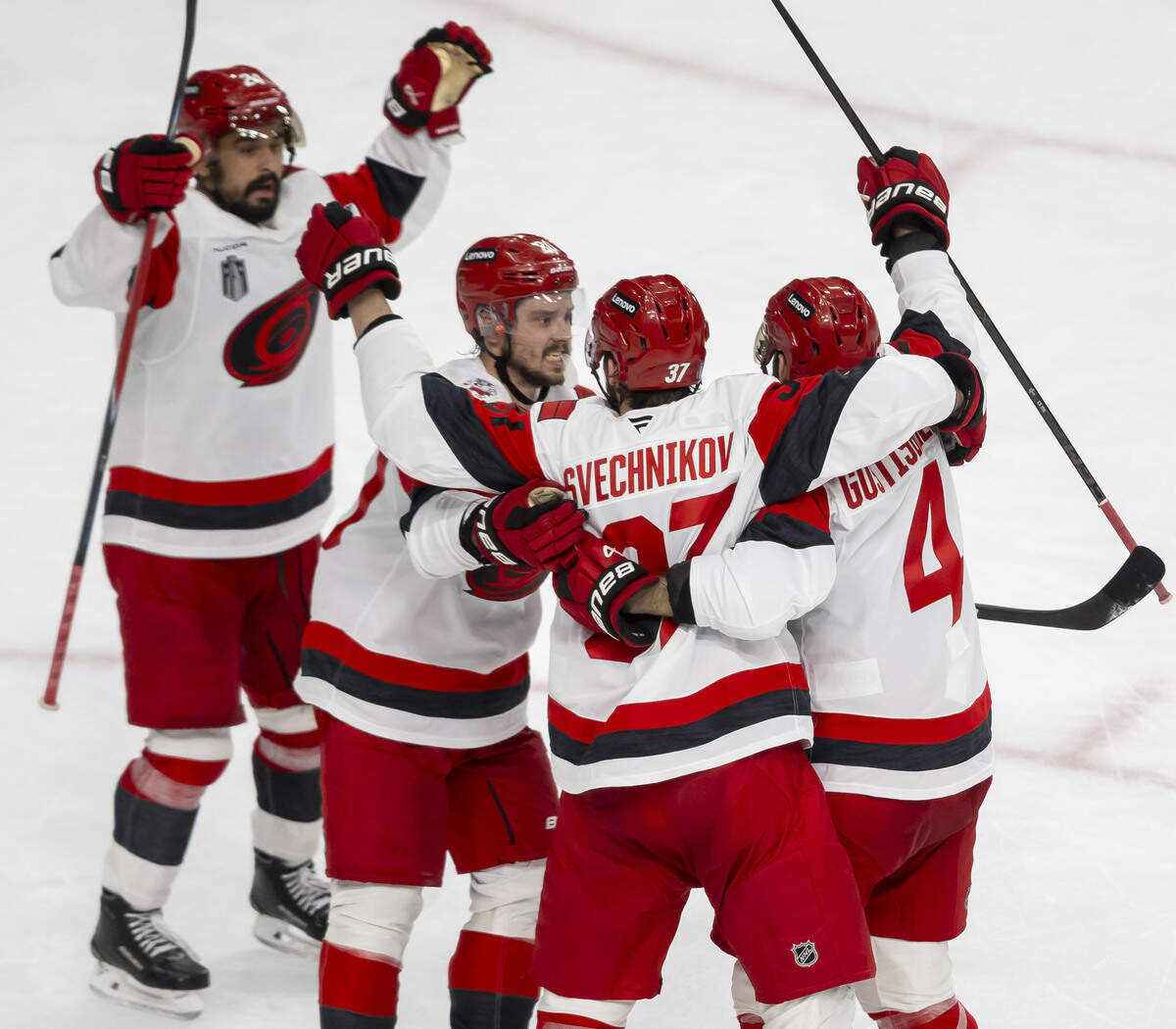 Carolina Hurricanes right wing Andrei Svechnikov (37) celebrates with teammates after scoring on Vegas goalie Carter Hart (79) to tie the score 4-4 and force overtime in Game 3 of the Stanley Cup Final, on Saturday, June 6, 2026 at T-Mobile Arena in Las Vegas, NV.