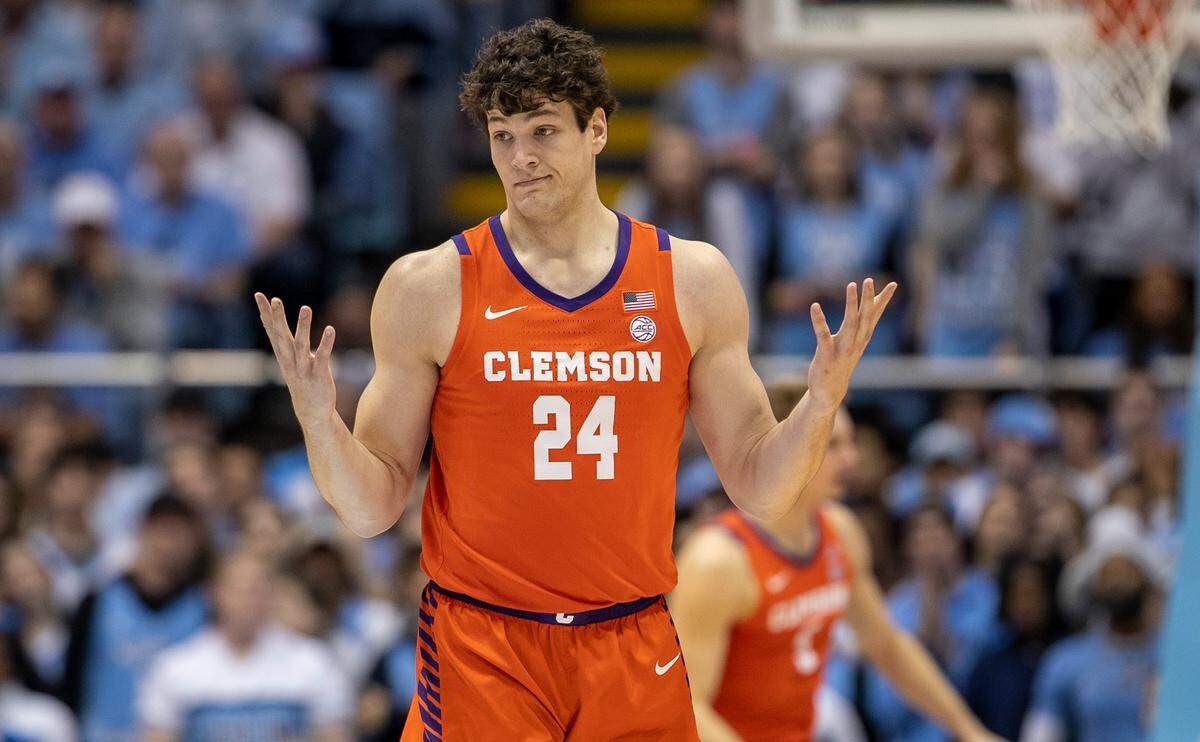 Clemson’s P.J. Hall (24) reacts after a three point basket in the first half against North Carolina on Saturday, February 11, 2023 at the Smith Center in Chapel Hill, N.C.
