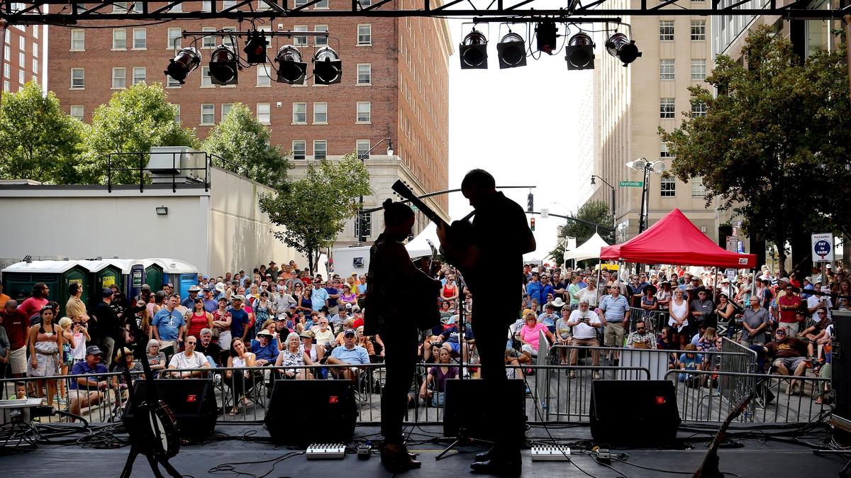 The Honey Dewdrops band members Laura Wortman, left, and Kagey Parrish perform in downtown Raleigh during the IBMA Bluegrass Festival in 2016. There are stages throughout downtown for World of Bluegrass.