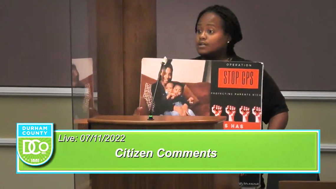 Amanda Wallace, founder of Operation Stop CPS, speaking at a Durham County Board of Commissioners meeting on July 11, 2022.