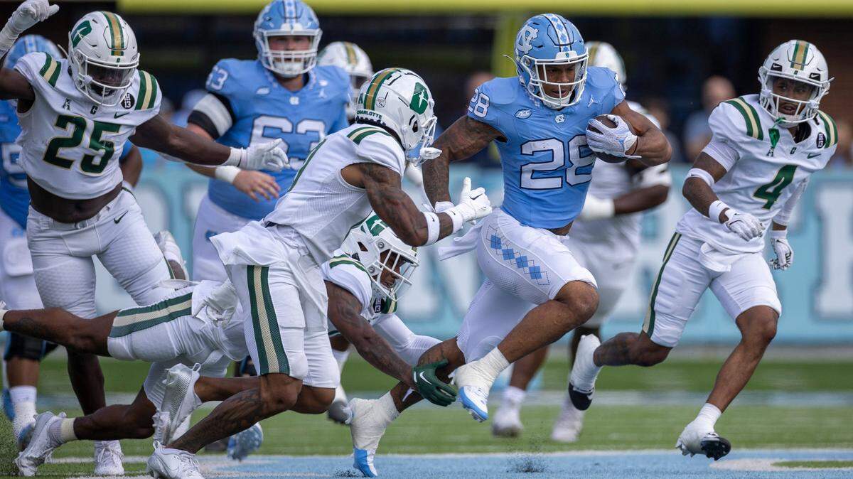 North Carolina running back Omarion Hampton (28) carries the ball for 26 yards during the first quarter against Charlotte on Saturday, September 7, 2024 at Kenan Stadium in Chapel Hill, N.C.