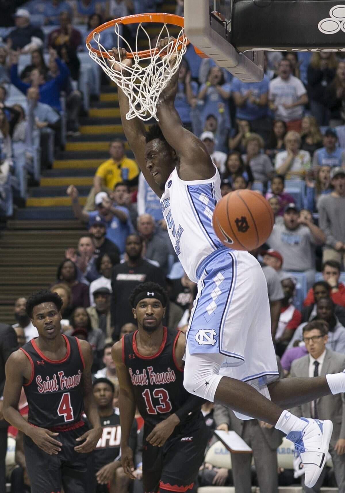 North Carolina’s Nassir Little (5) gets a dunk in the first half against St. Francis on Monday, November 19, 2018 at the Smith Center in Chapel Hill, N.C. Little scored 19 points in the Tar Heels’ 101-76 victo