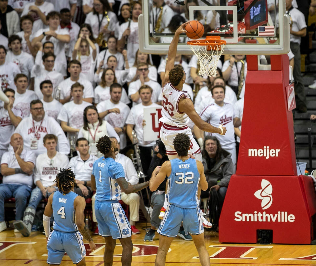 Indiana’s Trayce Jackson-Davis (23) beats North Carolina’s R.J. Davis (4), Leaky Black (1) and Pete Nance (32) to the basket on a fast break in the first half on Wednesday, November 30, 2022 at Assembly Hall in Bloomington, IN. Jackson-Davis lead all scores with 21 points.