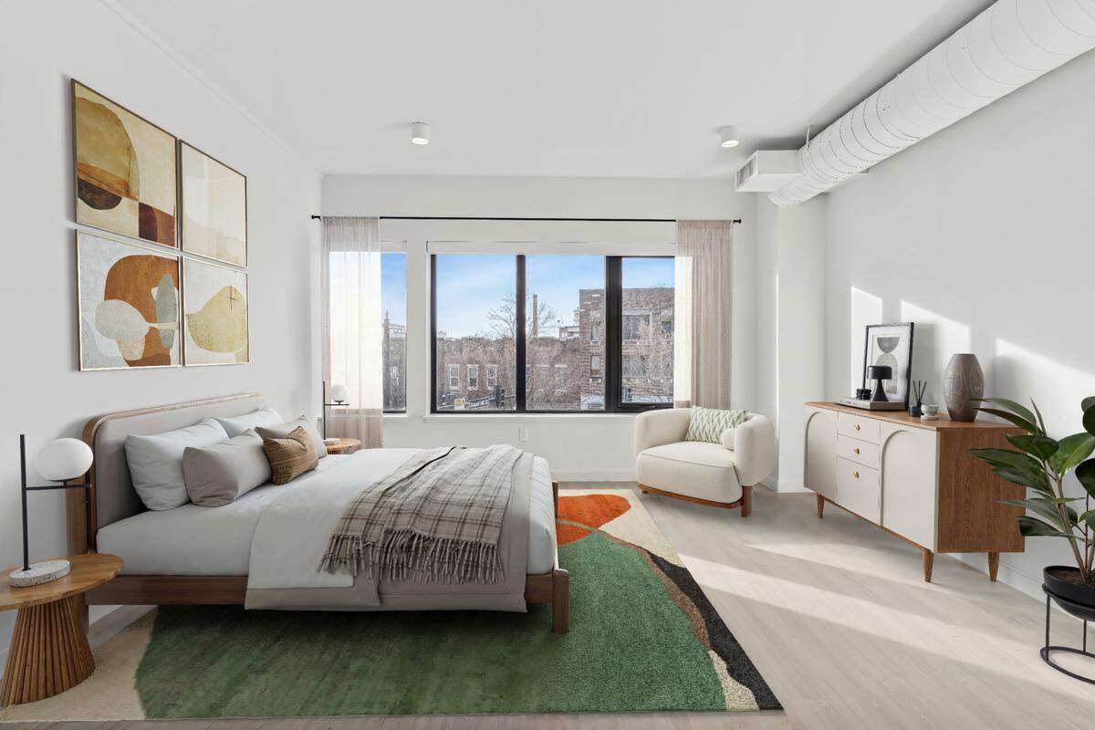A bedroom view from one of the new apartments inside The Novus, a glassy high-rise at 400 W. Main St. in Durham’s Five Points district.