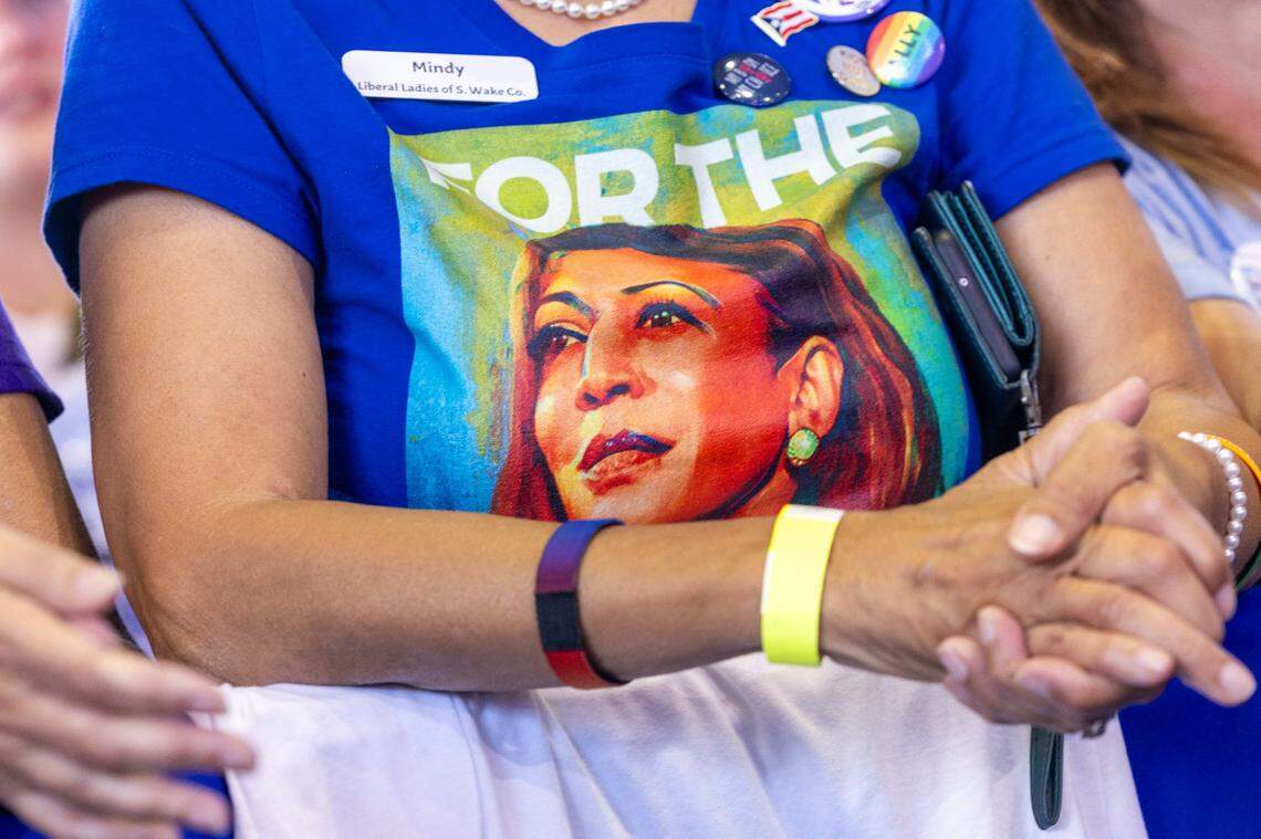 Supporters listen as Vice President Kamala Harris speaks during a rally at Coastal Credit Union Music Park at Walnut Creek in Raleigh on Wednesday, Oct. 30, 2024.