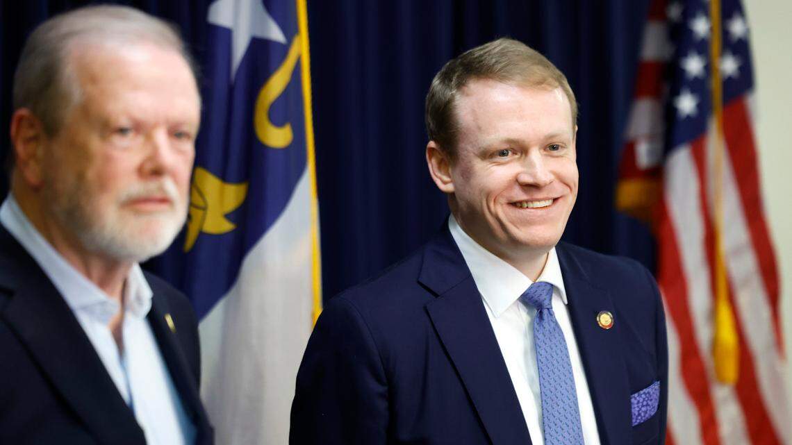N.C. Rep. Destin Hall smiles as he listens to a question during a press conference at the N.C. Republican Party headquarters in Raleigh, N.C., Wednesday, Nov. 6, 2024. N.C. Senate leader Phil Berger stands to the left.