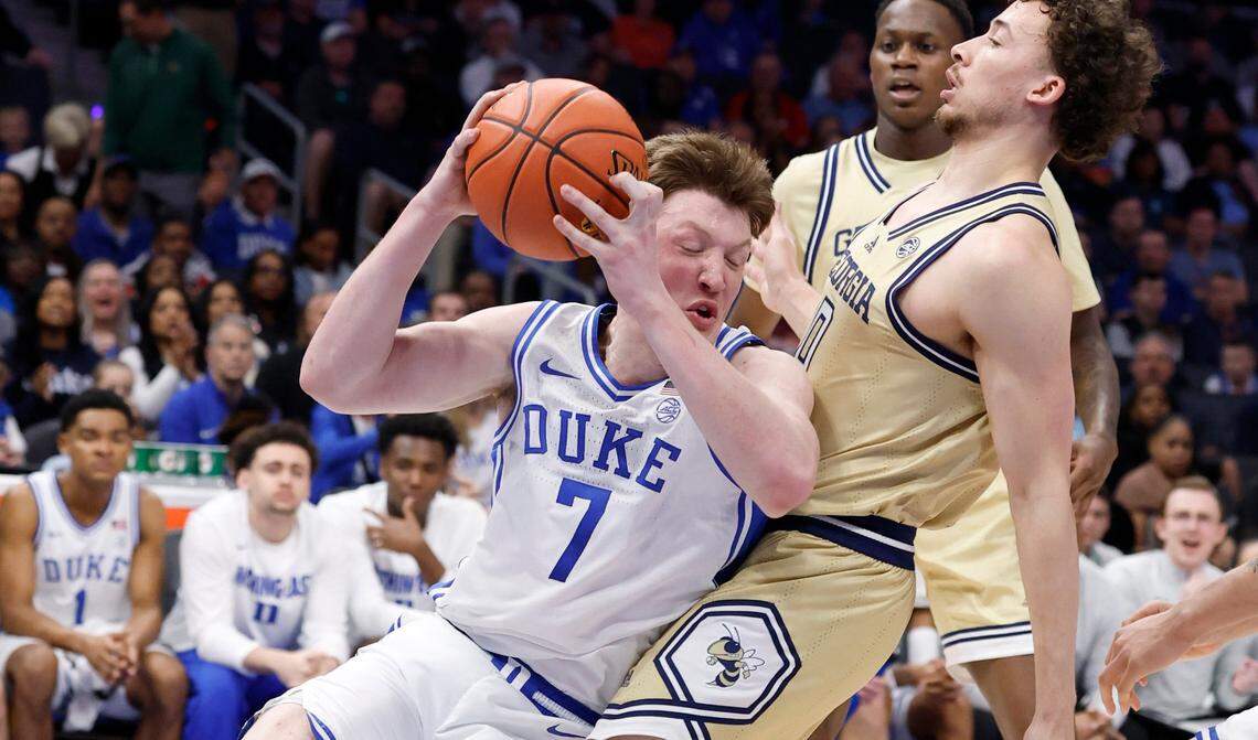 Duke’s Kon Knueppel (7) is fouled by Georgia Tech’s Lance Terry (0) during the first half of Duke’s game against Georgia Tech in the quarterfinals of the 2025 ACC Men’s Basketball Tournament at the Spectrum Center in Charlotte, N.C., Thursday, March 13, 2025.