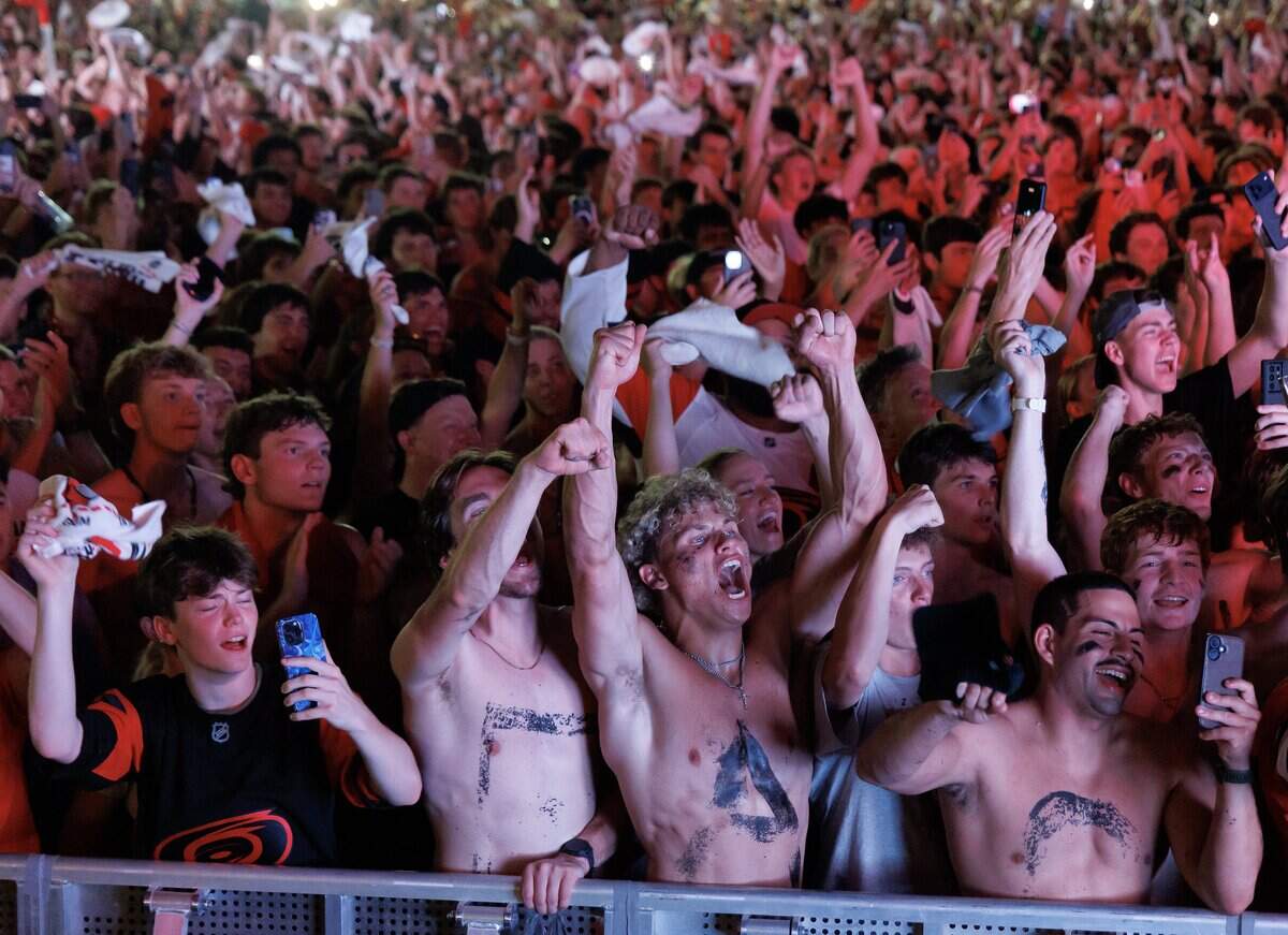 Carolina Hurricanes fans celebrate the team’s Stanley Cup victory over the Vegas Golden Knights during a watch party outside the Lenovo Center on Sunday, June 14, 2026, in Raleigh, N.C.