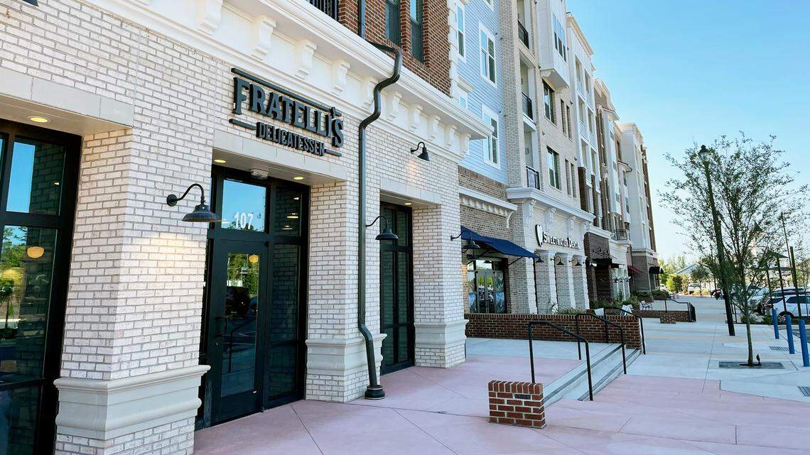 Restaurants, clinics and other businesses will open in the new Sweetwater Town Center development in Apex, North Carolina.