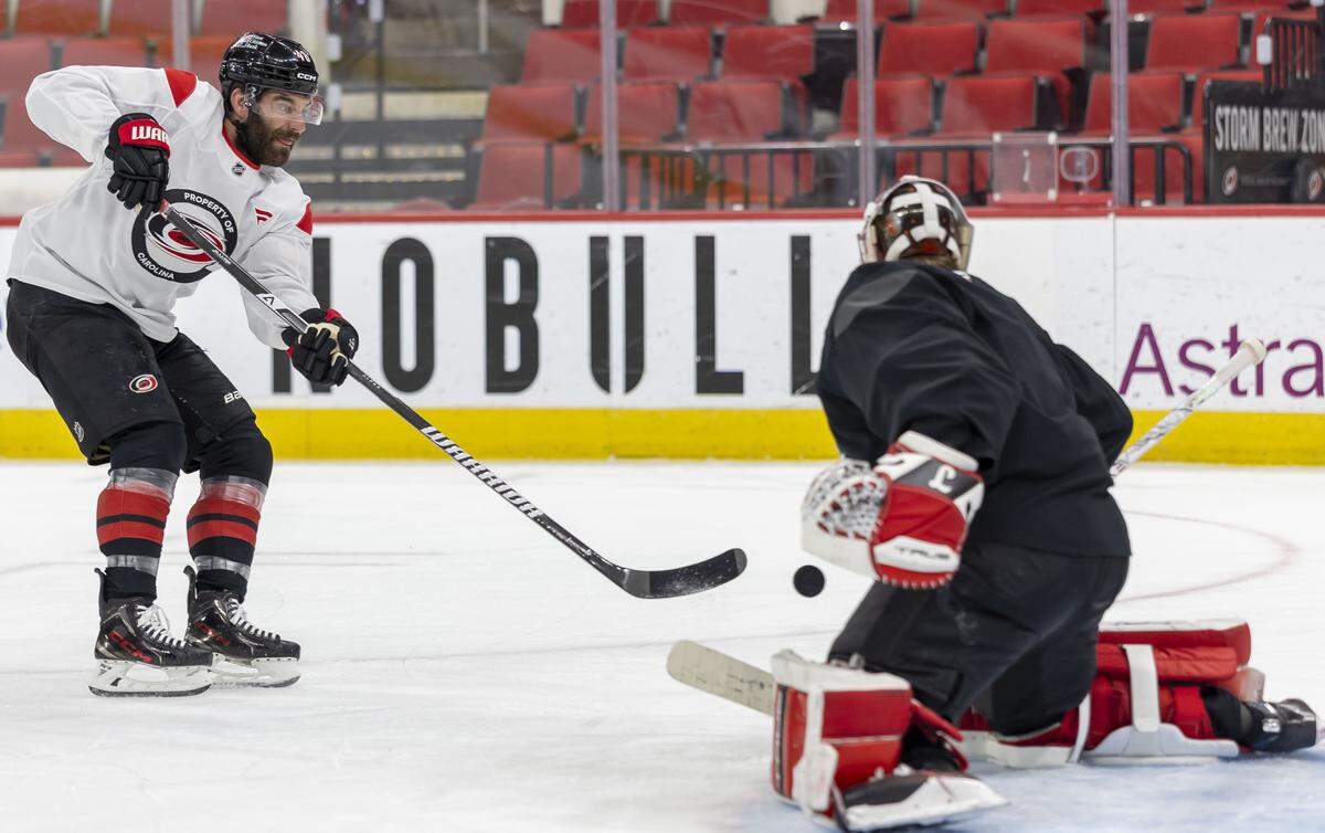 Carolina Hurricanes left wing Jordan Martinook (48) fires a shot on goalie Frederik Andersen (31) as they prepare for the Game 1 of the Stanley Cup Playoffs against Las Vegas, on Monday June 1, 2026 at Lenovo Center in Raleigh, N.C.