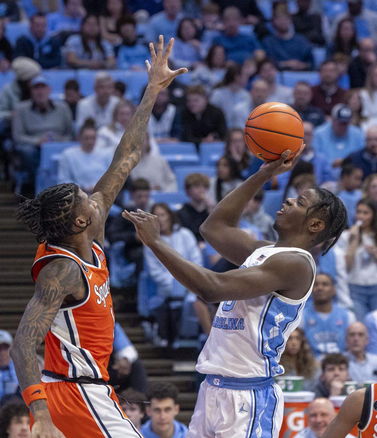 North Carolina forward Caleb Wilson (8) drives to the basket in the second half against Syracuse forward Donnie Freeman (1) on Monday, February 2, 2026 at the Smith Center in Chapel Hill, N.C.