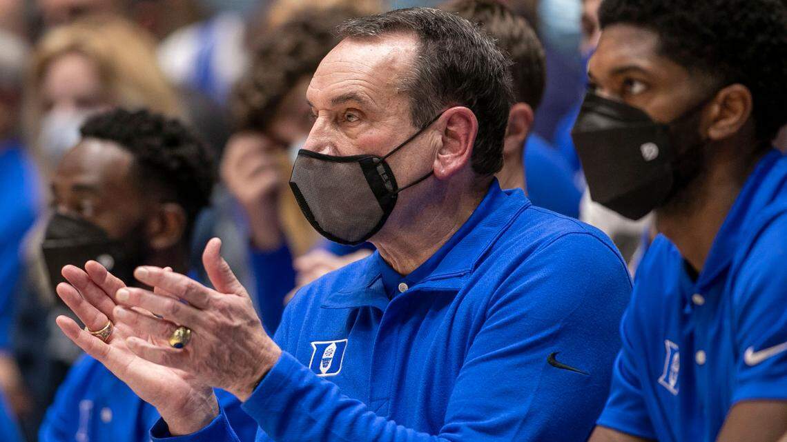 Duke coach Mike Krzyzewski and his assistants wear face coverings after assistant coach Nolan Smith missed the game against Elon due to the spread of the COVID-19 on Saturday, December 18, 2021 at Cameron Indoor Stadium in Durham, N.C.