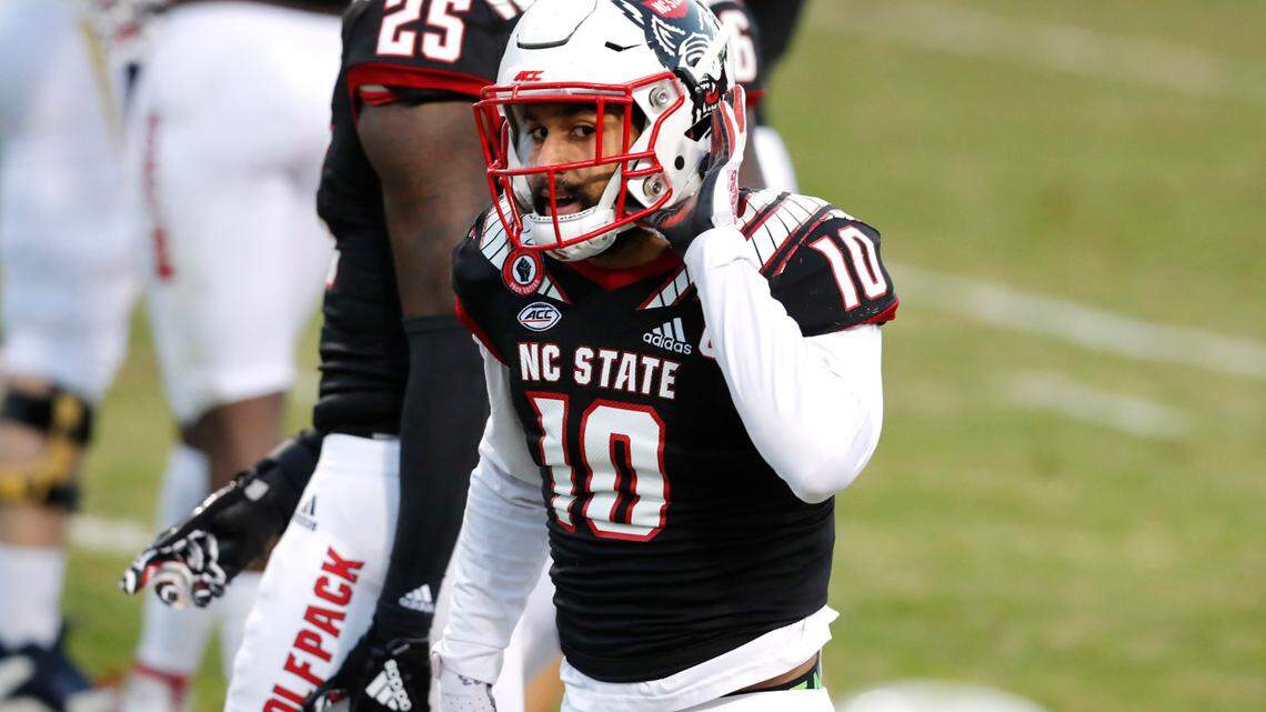 N.C. State safety Tanner Ingle (10) motions over to the Georgia Tech sideline during the first half of N.C. State’s game against Georgia Tech at Carter-Finley Stadium in Raleigh, N.C., Saturday, Dec. 5, 2020.